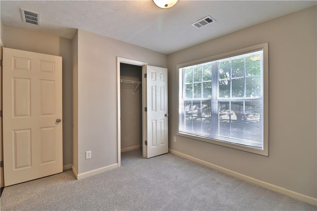 353 Fall View Court Winder, GA 30680 - Photo 46 of 61 an empty room with windows
