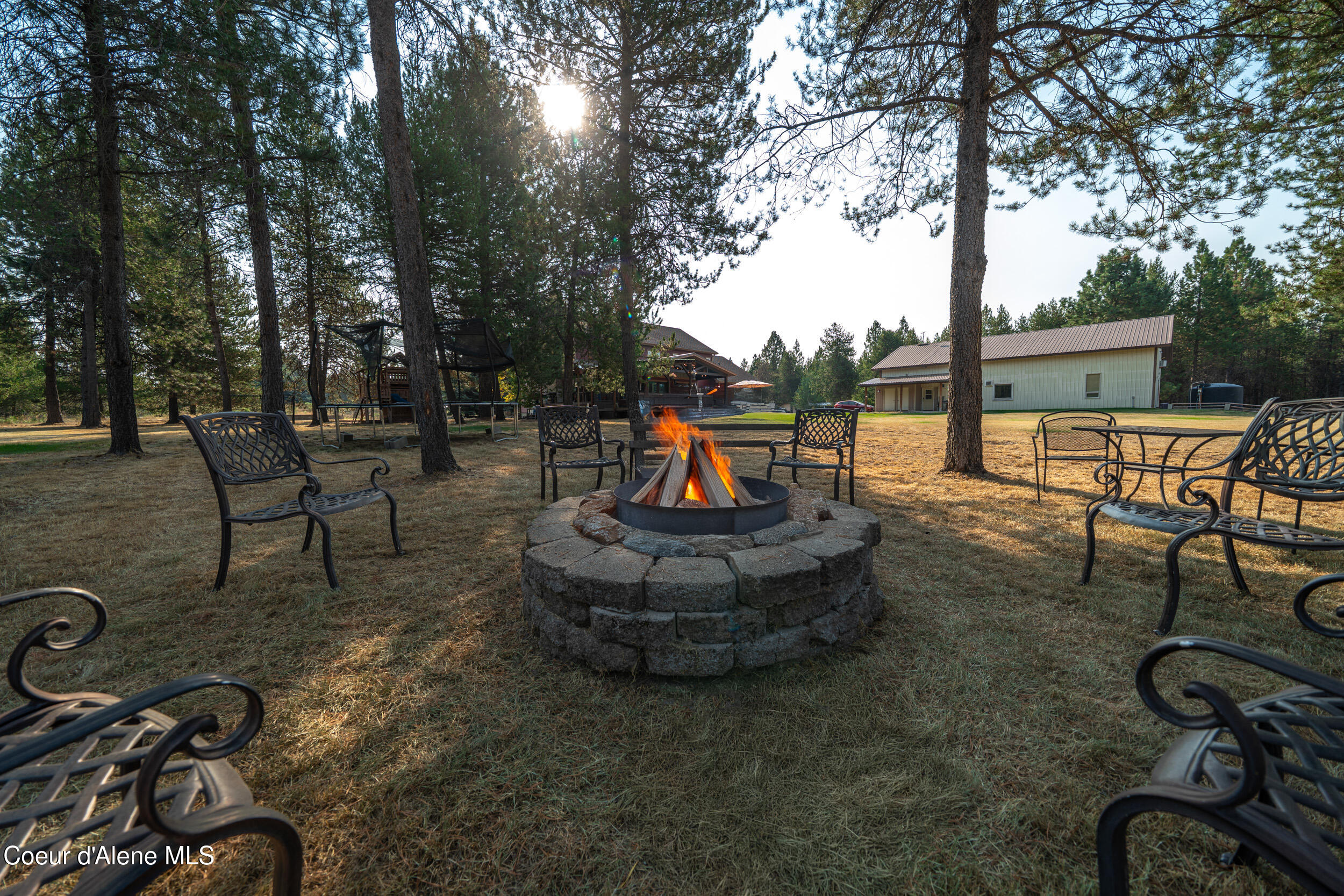 21779 North Ramsey Road Rathdrum, ID 83858 - Photo 46 of 68 Fire pit and shop