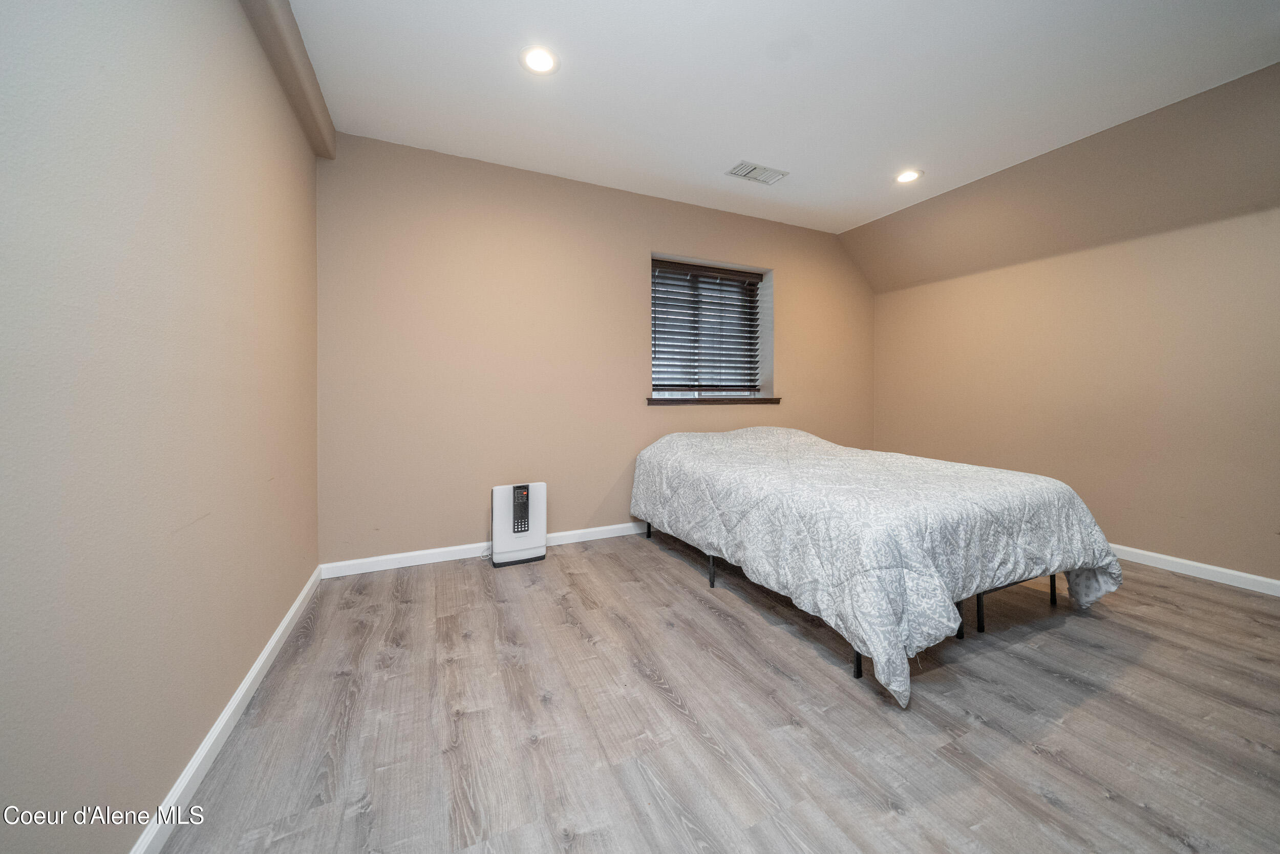 21779 North Ramsey Road Rathdrum, ID 83858 - Photo 54 of 68 Basement bedroom