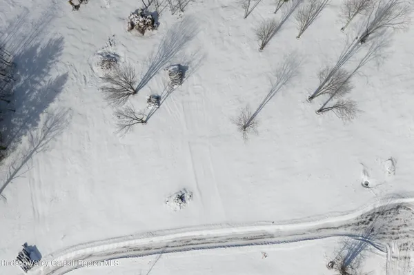 an aerial view of a swimming pool