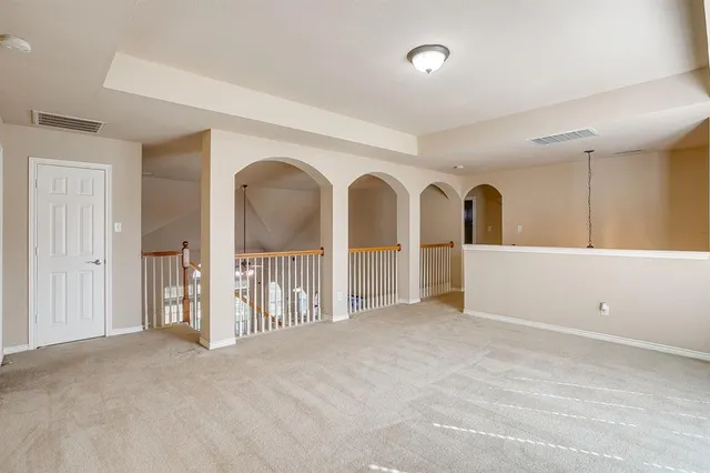 a bathroom with a sink mirror and vanity