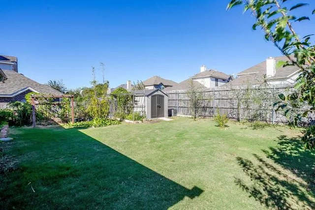 a view of a house with a garden