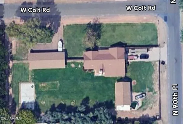 an aerial view of a house with a garden