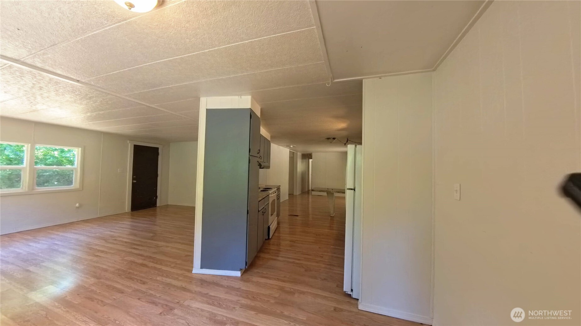 650 North Lake Cushman Road Hoodsport, WA 98548 - Photo 6 of 15 a view of hallway with wooden floor