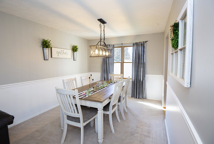 709 Landau Lane Normal, IL 61761 - Photo 11 of 44 a dining room with furniture a chandelier and wooden floor