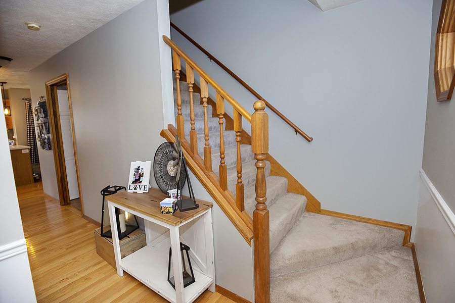 709 Landau Lane Normal, IL 61761 - Photo 13 of 44 a view of entryway and hall with wooden floor