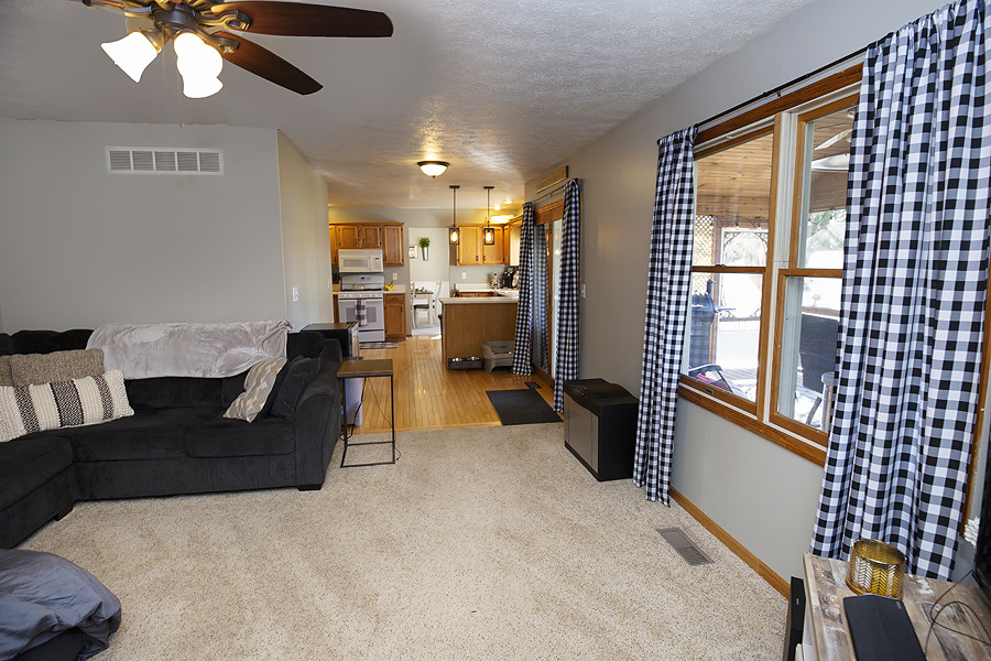 709 Landau Lane Normal, IL 61761 - Photo 16 of 44 a living room with furniture and a window