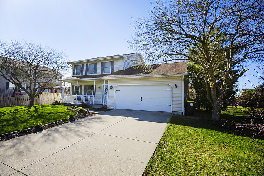 709 Landau Lane Normal, IL 61761 - Photo 35 of 44 a house view with a garden space