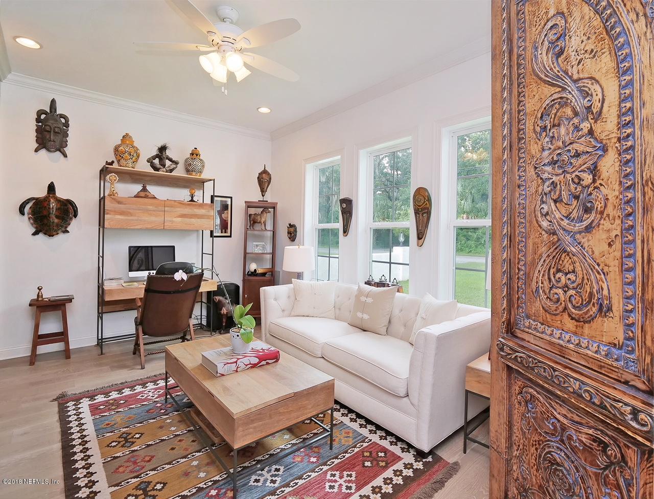 1161 Neck Road Ponte Vedra Beach, FL 32082 - Photo 13 of 24 a living room with furniture and a chandelier