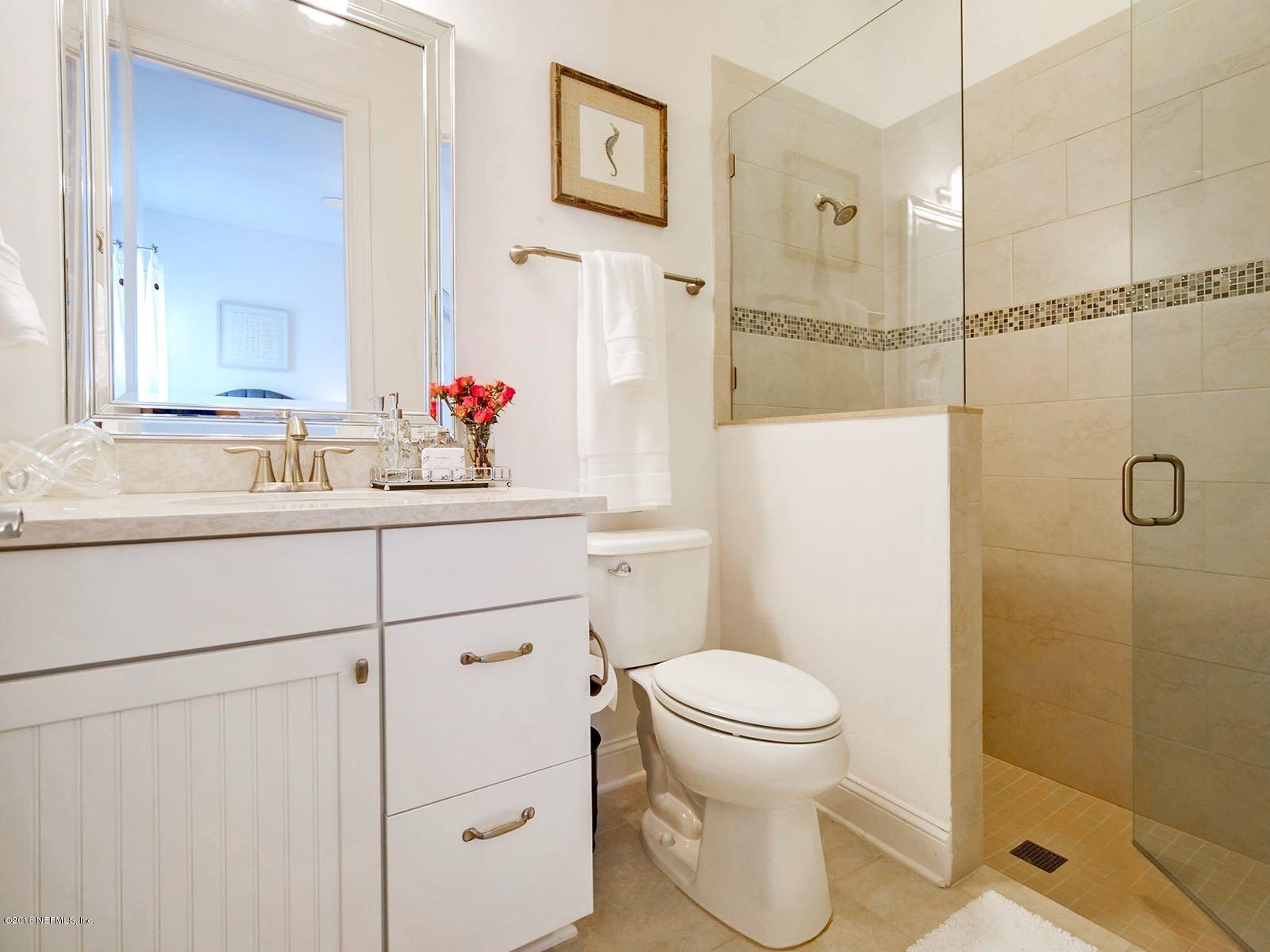 1161 Neck Road Ponte Vedra Beach, FL 32082 - Photo 18 of 24 a bathroom with a sink toilet and shower