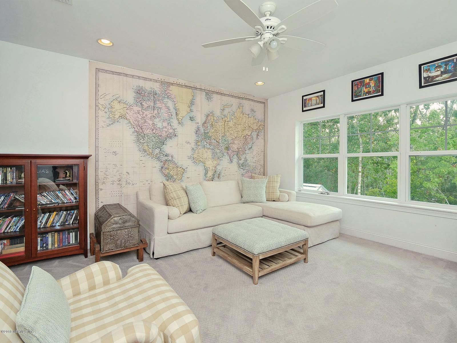 1161 Neck Road Ponte Vedra Beach, FL 32082 - Photo 19 of 24 a living room with furniture and a large window
