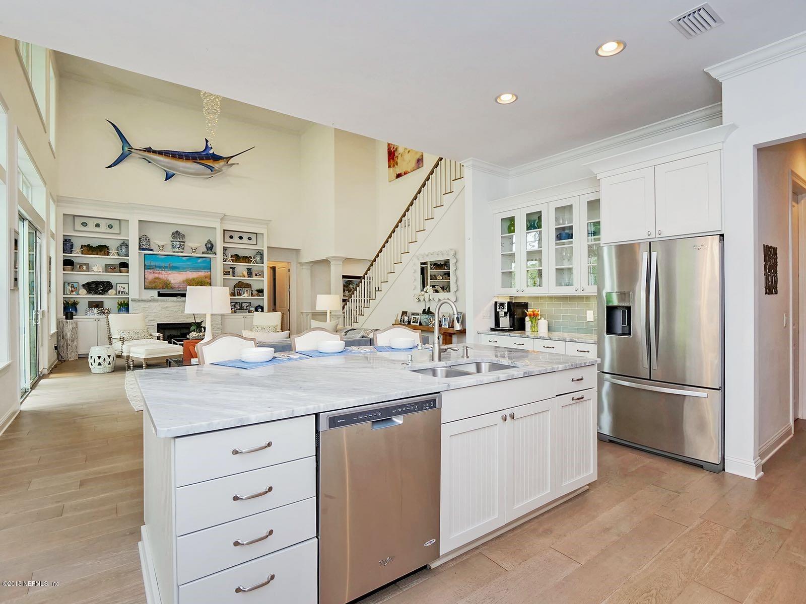 1161 Neck Road Ponte Vedra Beach, FL 32082 - Photo 7 of 24 a kitchen with refrigerator and cabinets