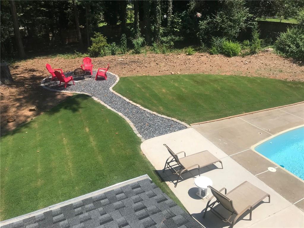 302 Independence Way Woodstock, GA 30188 - Photo 62 of 65 Hardscaped Fire Pit and Pool
