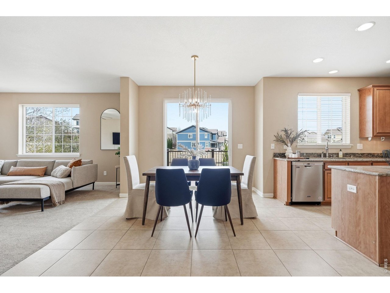 1277 Mathews Way Erie, CO 80516 - Photo 10 of 40 a view of a dining room with furniture window and outside view