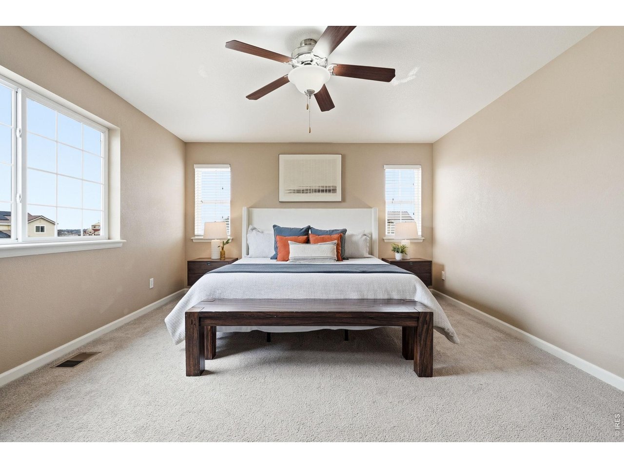 1277 Mathews Way Erie, CO 80516 - Photo 16 of 40 a bedroom with a bed and window