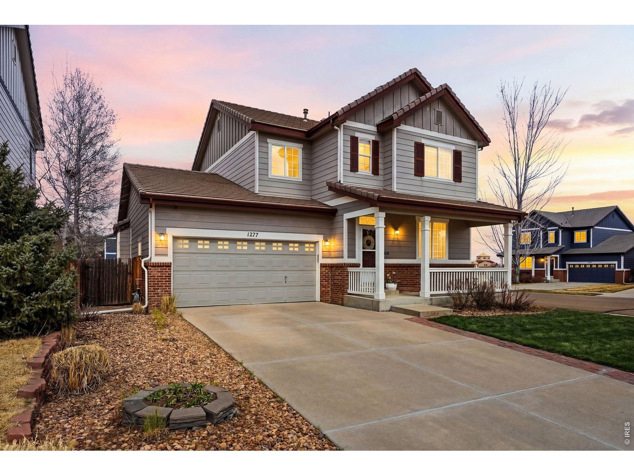 1277 Mathews Way Erie, CO 80516 - Photo 2 of 40 a view of a house with a yard and pathway
