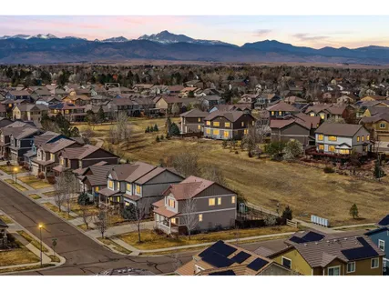 a view of a balcony with wooden floor