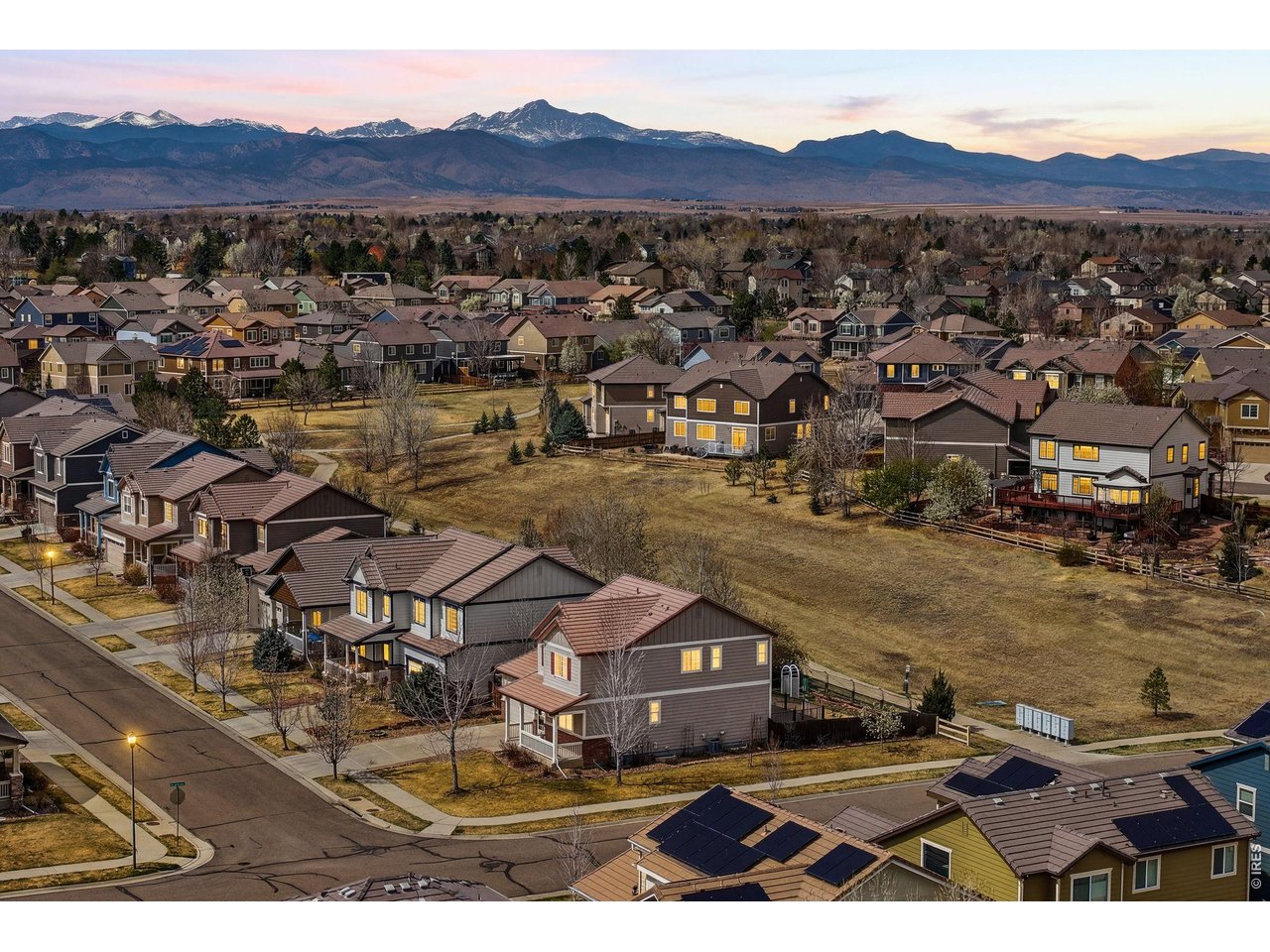 1277 Mathews Way Erie, CO 80516 - Photo 34 of 40 an aerial view of residential houses with outdoor space