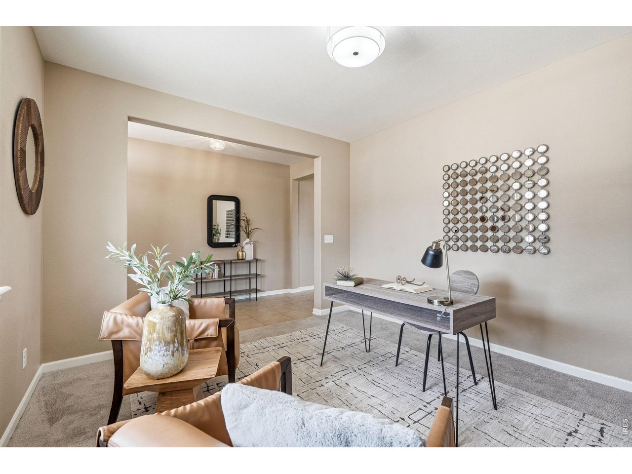 1277 Mathews Way Erie, CO 80516 - Photo 6 of 40 a living room with furniture and wooden floor