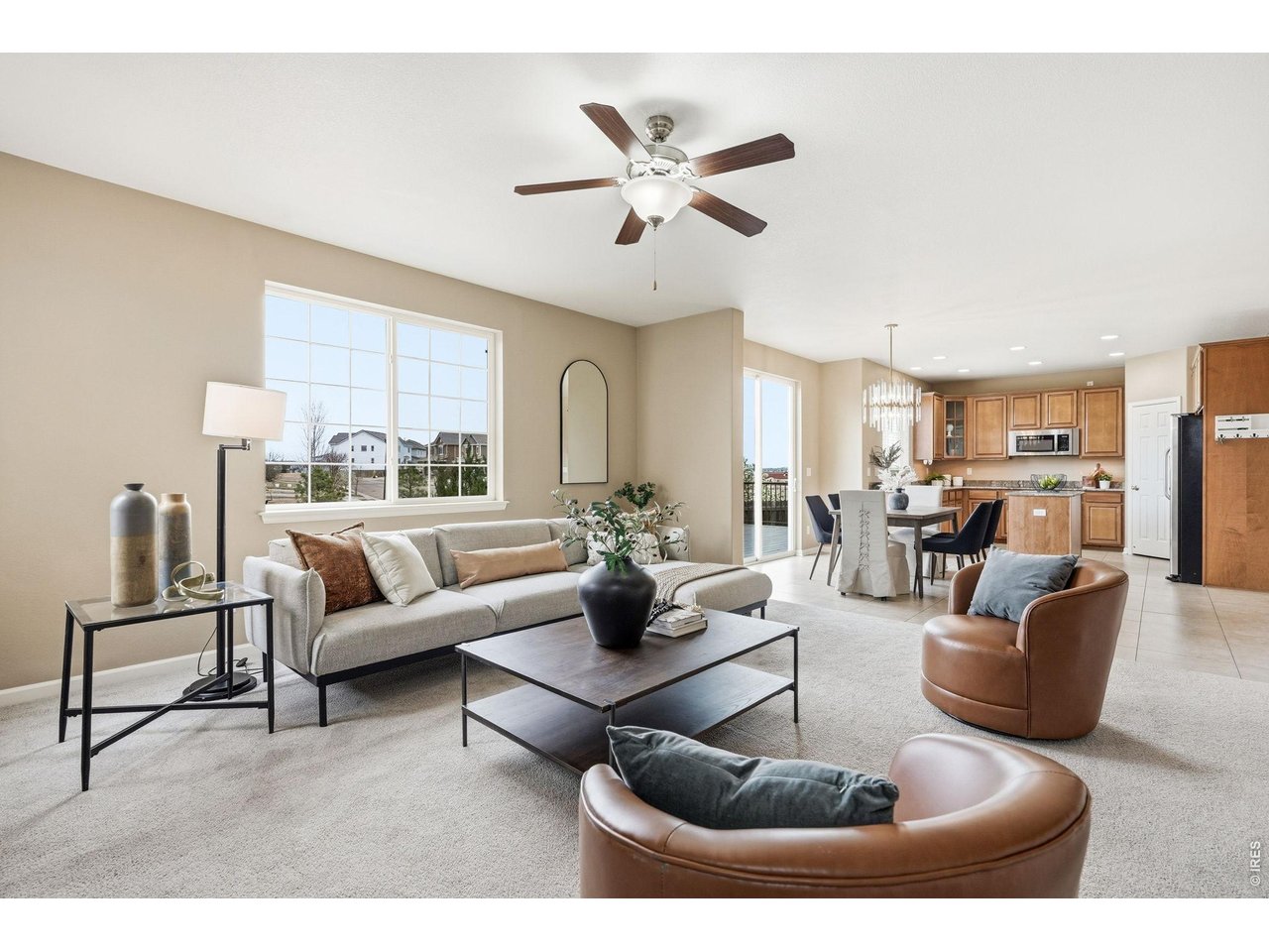 1277 Mathews Way Erie, CO 80516 - Photo 40 of 40 a living room with furniture and a large window