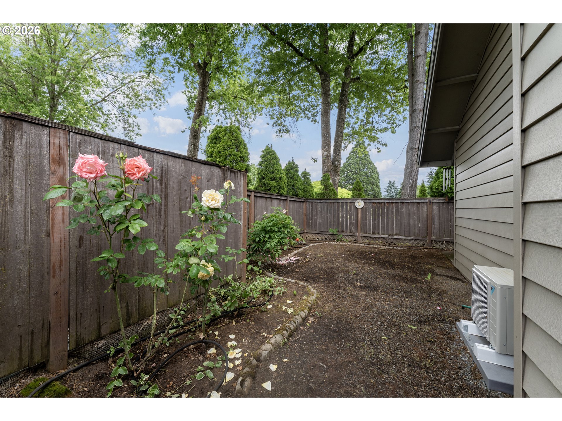 11341 Southwest Springwood Drive Portland, OR 97223 - Photo 26 of 26 a backyard of a house with lots of green space