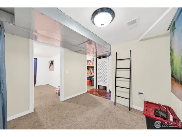 a view of a livingroom with furniture