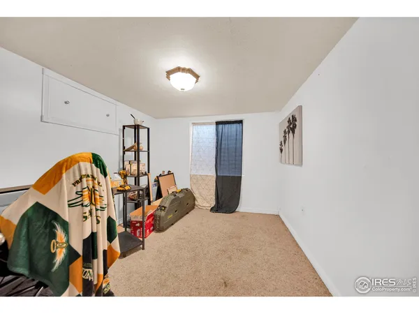 a view of a livingroom with wooden floor