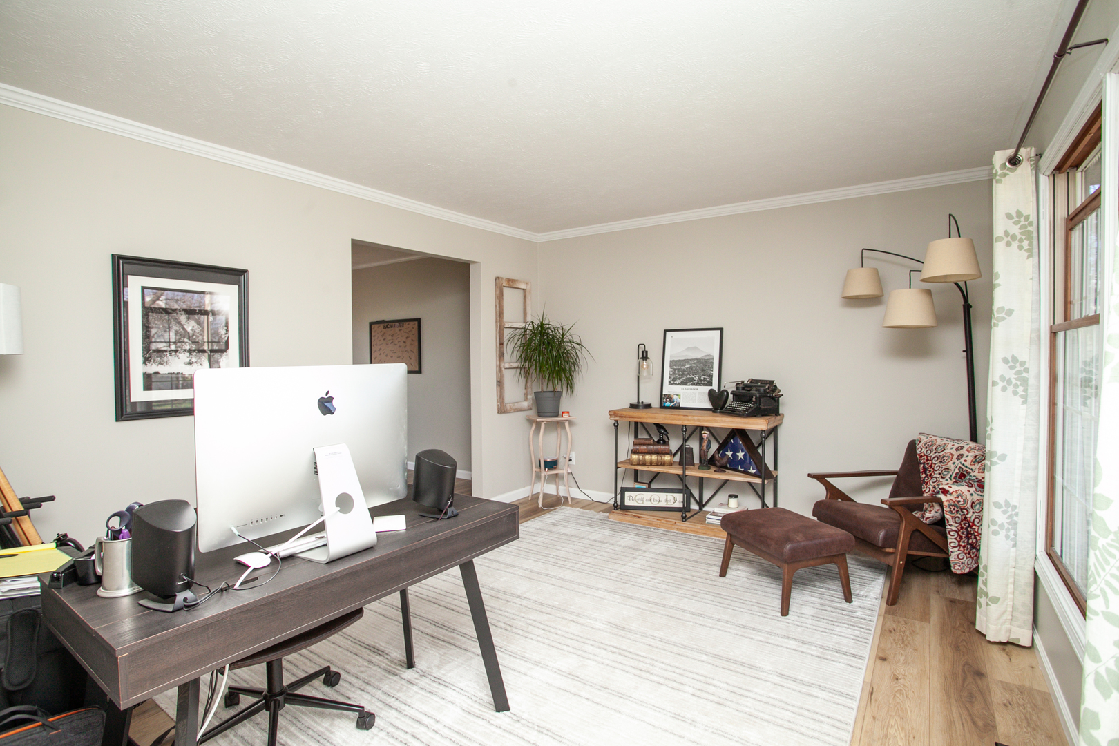 1308 Mill Creek Road Bloomington, IL 61704 - Photo 14 of 26 a workspace with furniture and wooden floor