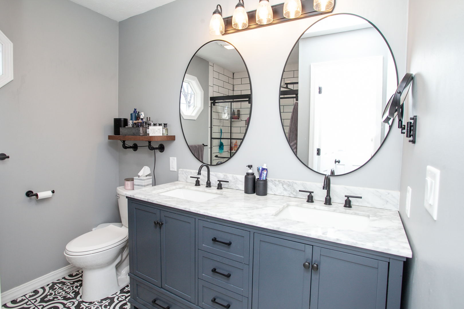 1308 Mill Creek Road Bloomington, IL 61704 - Photo 19 of 26 a bathroom with 2 sink and a mirror