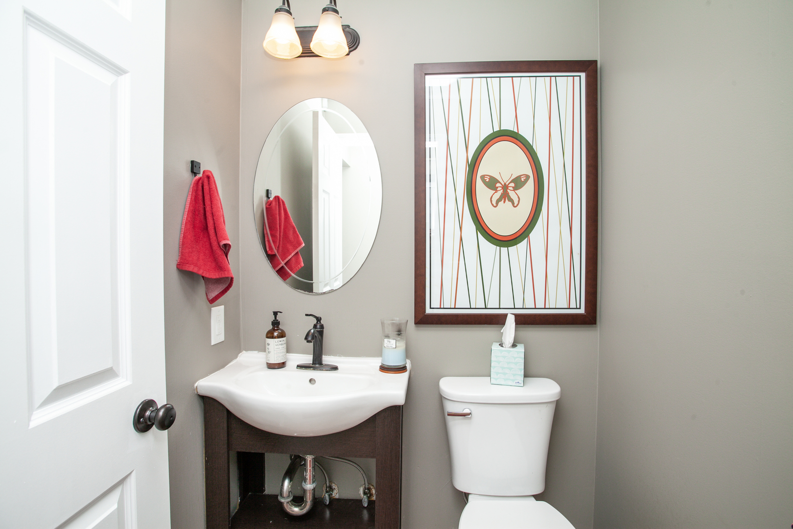 1308 Mill Creek Road Bloomington, IL 61704 - Photo 20 of 26 a bathroom with a sink and a mirror