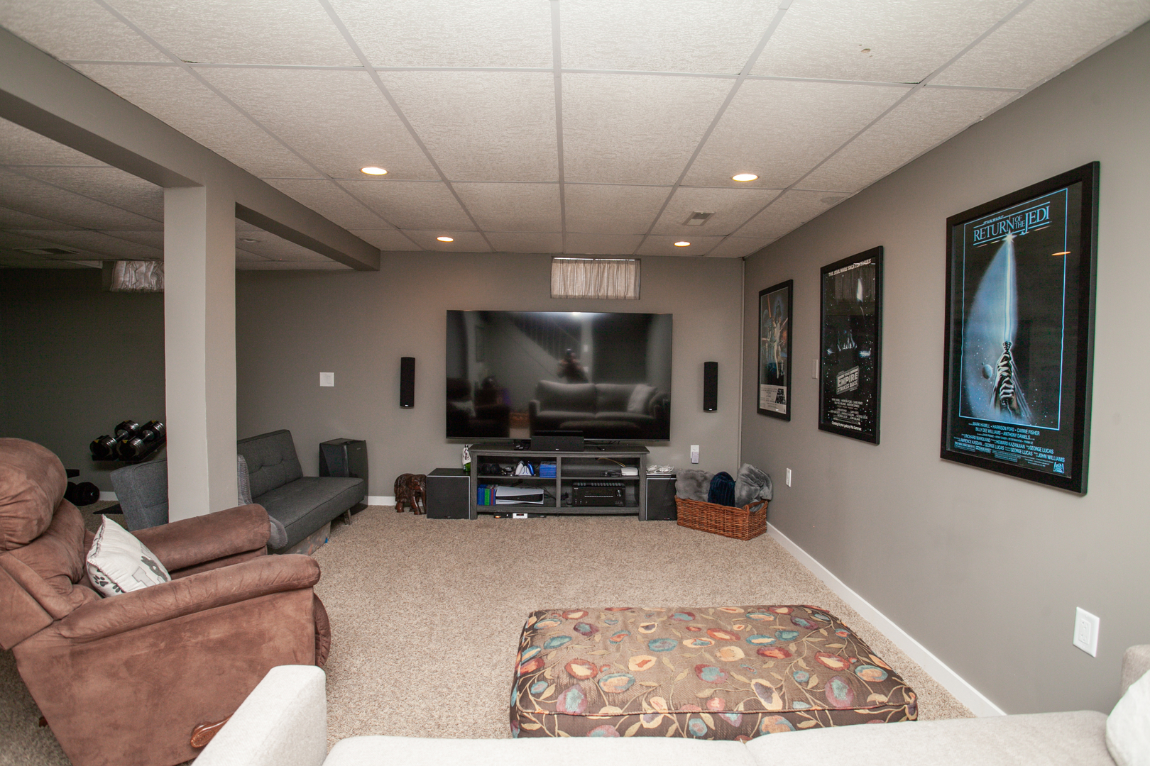1308 Mill Creek Road Bloomington, IL 61704 - Photo 26 of 26 a living room with furniture and a flat screen tv