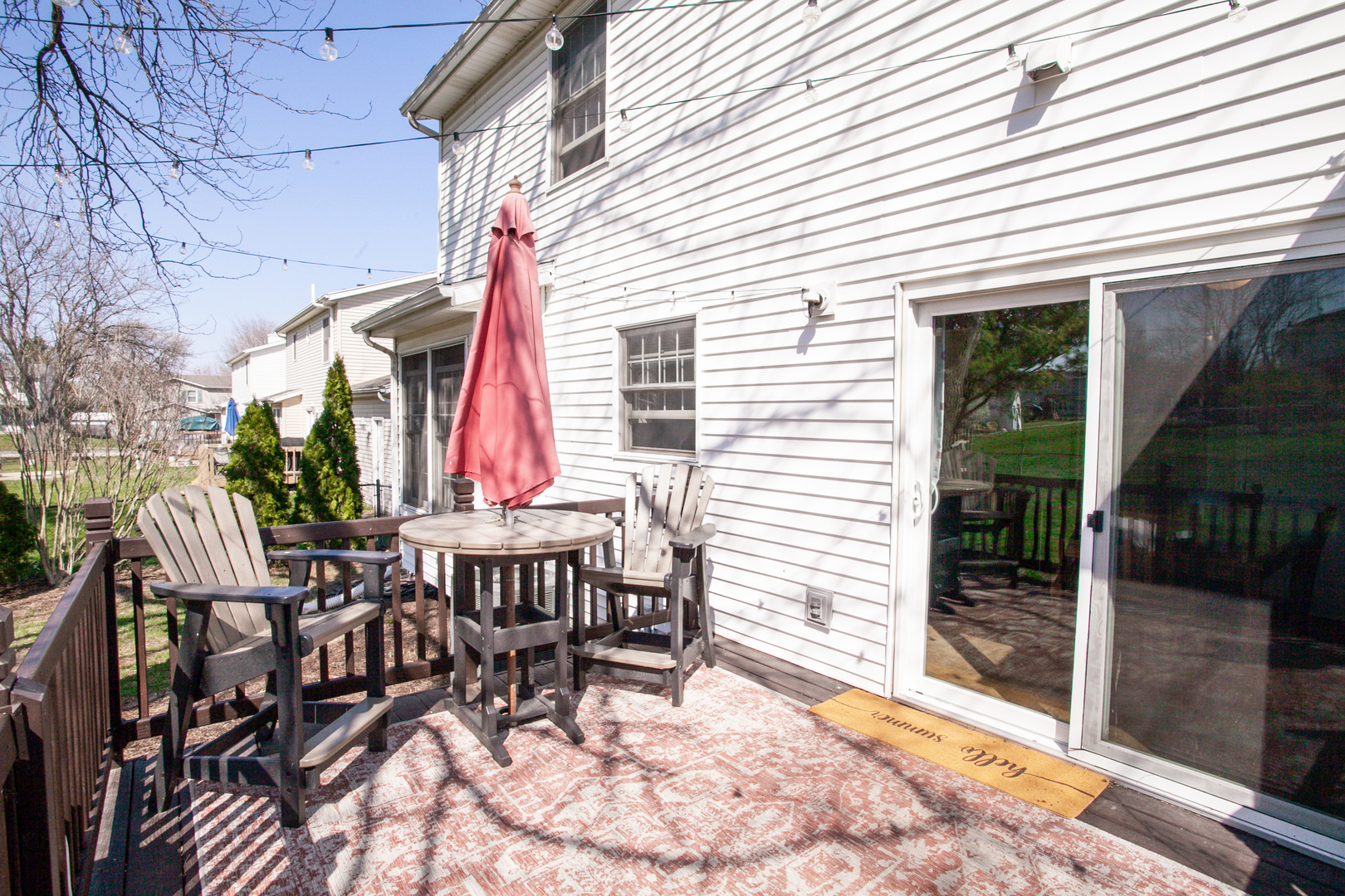 1308 Mill Creek Road Bloomington, IL 61704 - Photo 5 of 26 a view of a dinning tables and chairs in patio of the house