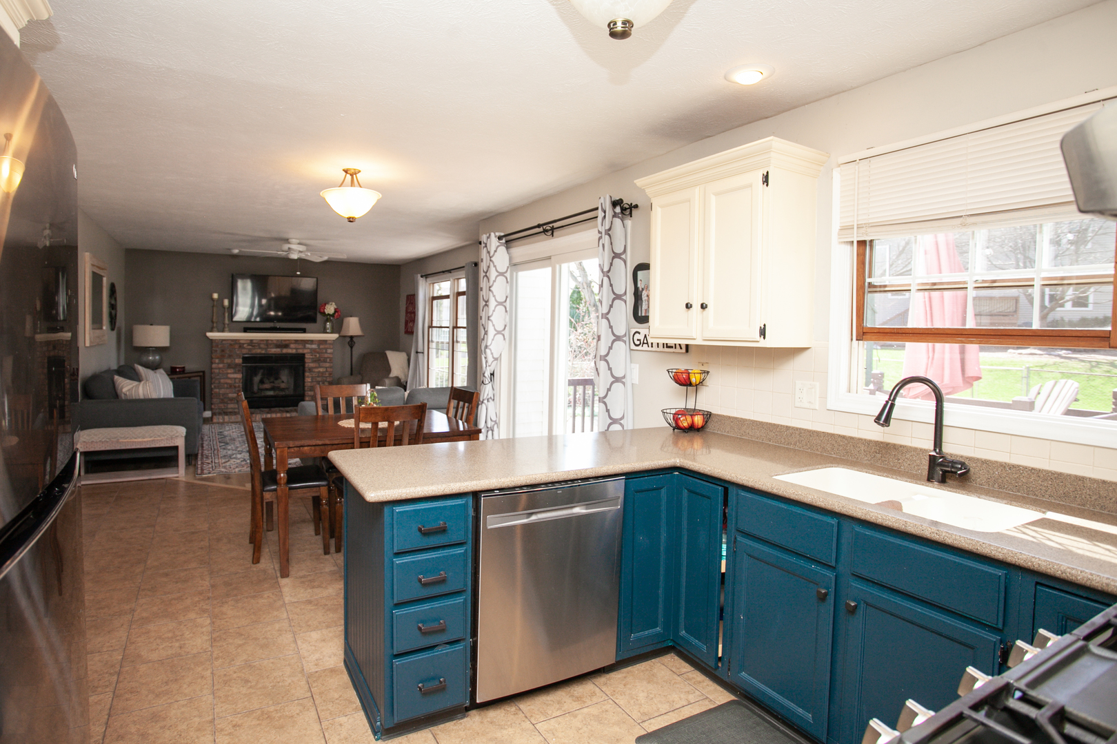 1308 Mill Creek Road Bloomington, IL 61704 - Photo 7 of 26 a kitchen with a sink stove and refrigerator