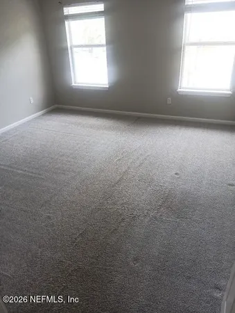 an empty room with a window