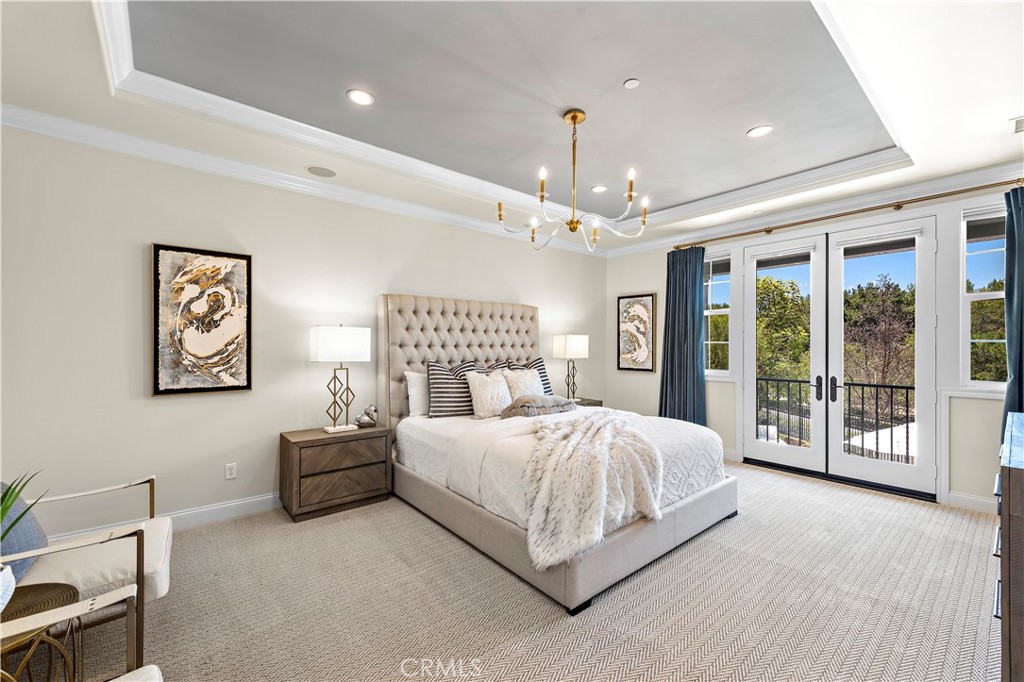 2 Anna Lane Ladera Ranch, CA 92694 - Photo 18 of 63 a bedroom with a large bed and a tv