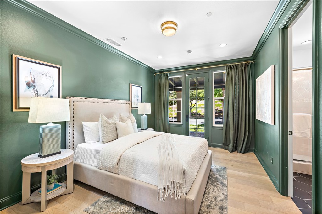 2 Anna Lane Ladera Ranch, CA 92694 - Photo 26 of 63 a bedroom with a bed and a table in it