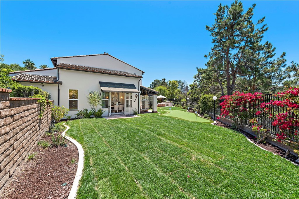 2 Anna Lane Ladera Ranch, CA 92694 - Photo 37 of 63 a front view of a house with a yard