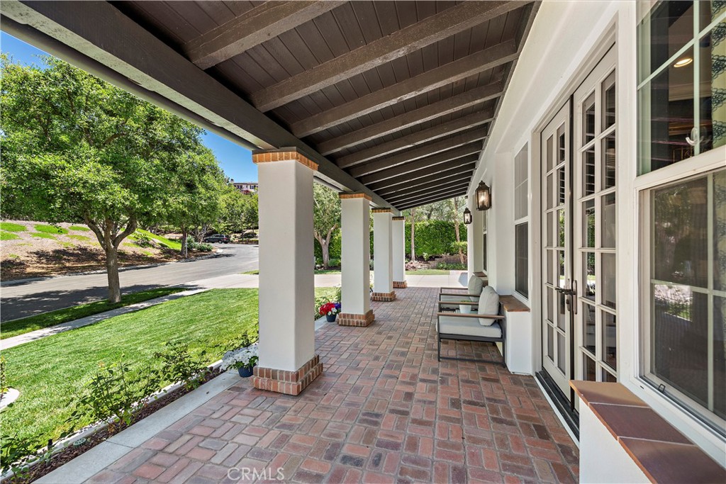 2 Anna Lane Ladera Ranch, CA 92694 - Photo 4 of 63 a view of a porch with chairs and backyard