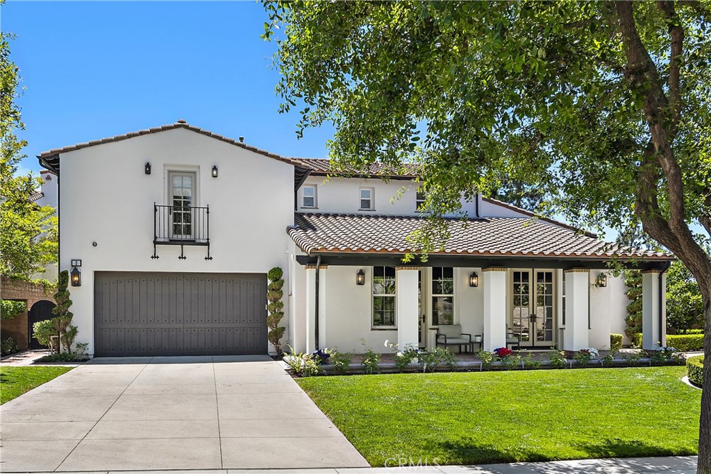 2 Anna Lane Ladera Ranch, CA 92694 - Photo 41 of 63 a front view of a house with a yard and garage