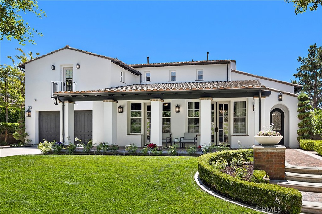 2 Anna Lane Ladera Ranch, CA 92694 - Photo 43 of 63 a front view of a house with a yard table and chairs