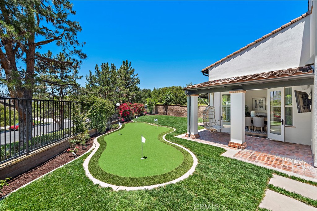 2 Anna Lane Ladera Ranch, CA 92694 - Photo 6 of 63 a view of a house with a backyard porch and sitting area