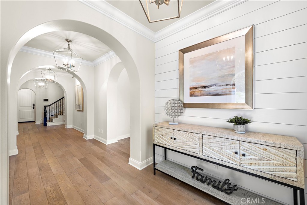2 Anna Lane Ladera Ranch, CA 92694 - Photo 7 of 63 a view of a livingroom with wooden floor and cabinet