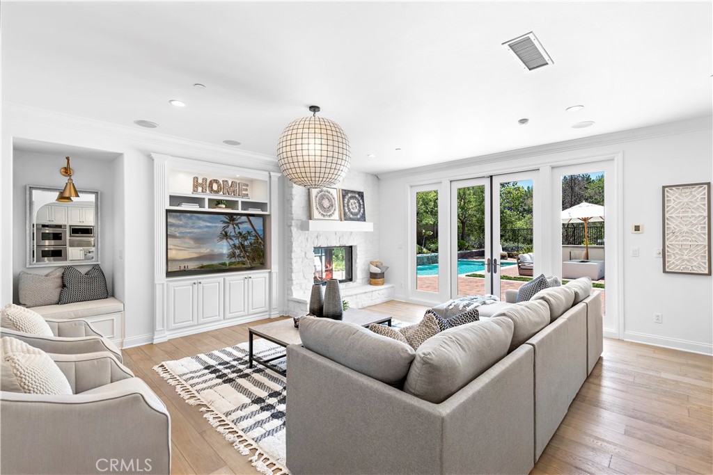 2 Anna Lane Ladera Ranch, CA 92694 - Photo 10 of 63 a living room with furniture and a large window