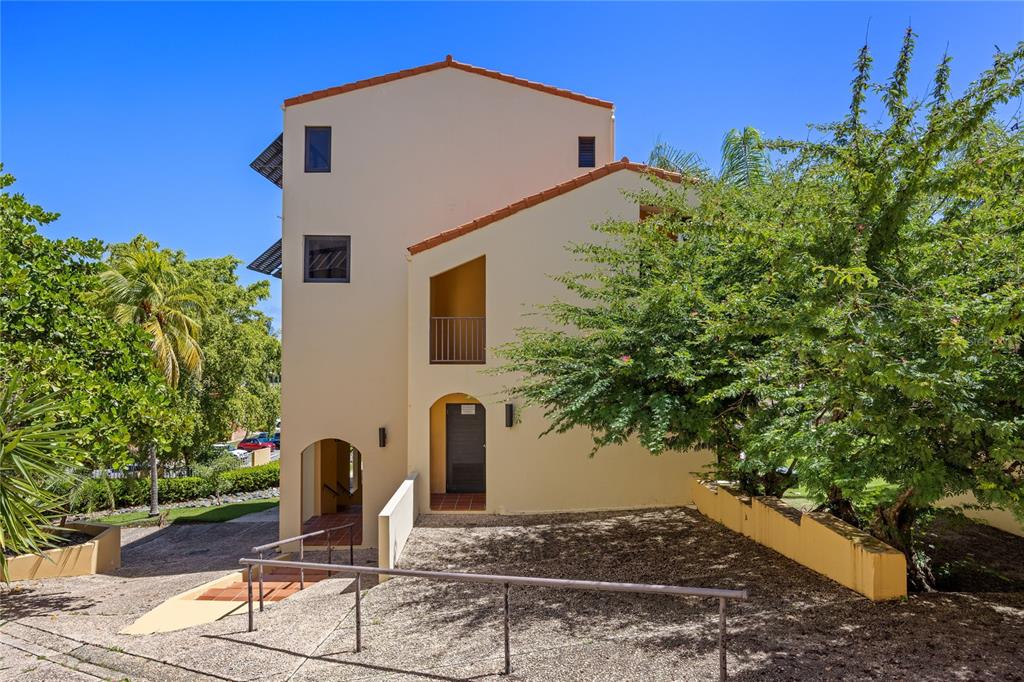 2066 Montesol, Unit 2066 Humacao, PR 00792 - Photo 1 of 29 a view of a house with backyard