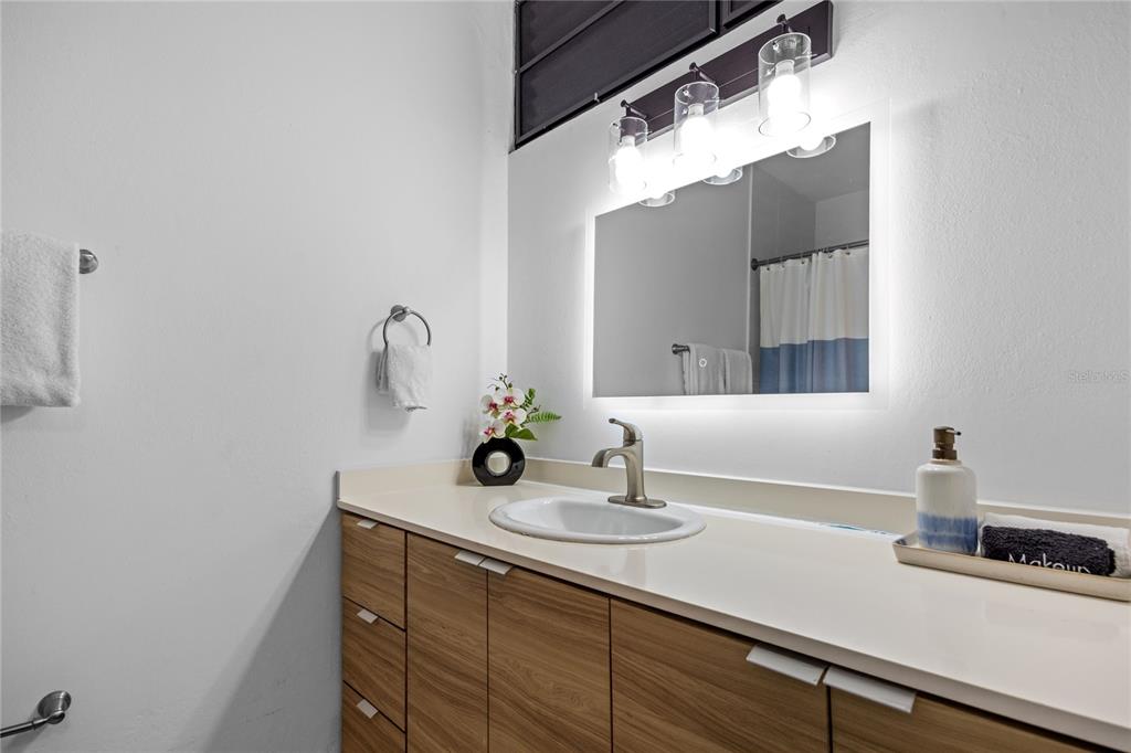 2066 Montesol, Unit 2066 Humacao, PR 00792 - Photo 15 of 29 a bathroom with a sink and a mirror