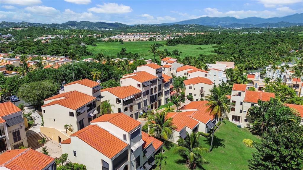 2066 Montesol, Unit 2066 Humacao, PR 00792 - Photo 27 of 29 an aerial view of residential houses and outdoor space