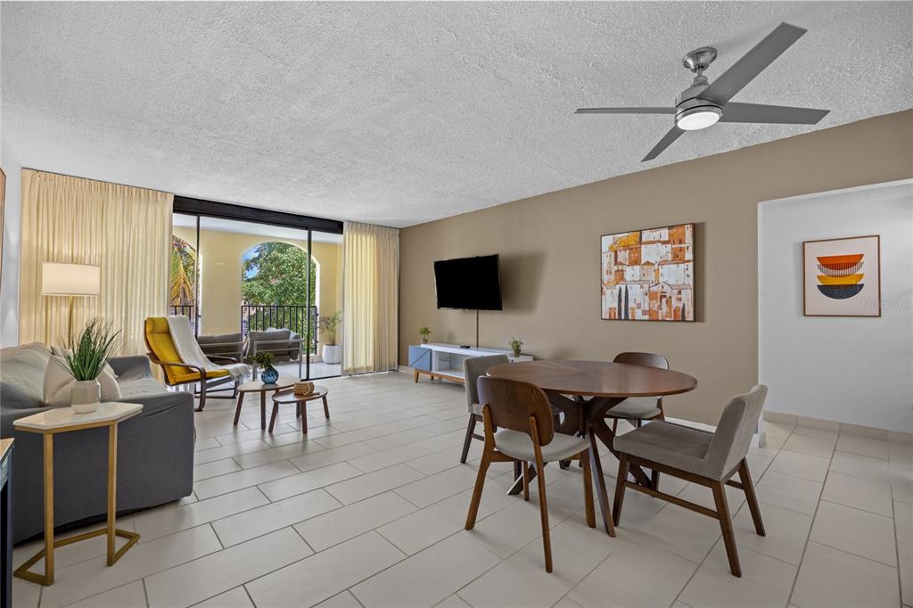 2066 Montesol, Unit 2066 Humacao, PR 00792 - Photo 3 of 29 a view of a livingroom with furniture and a flat screen tv