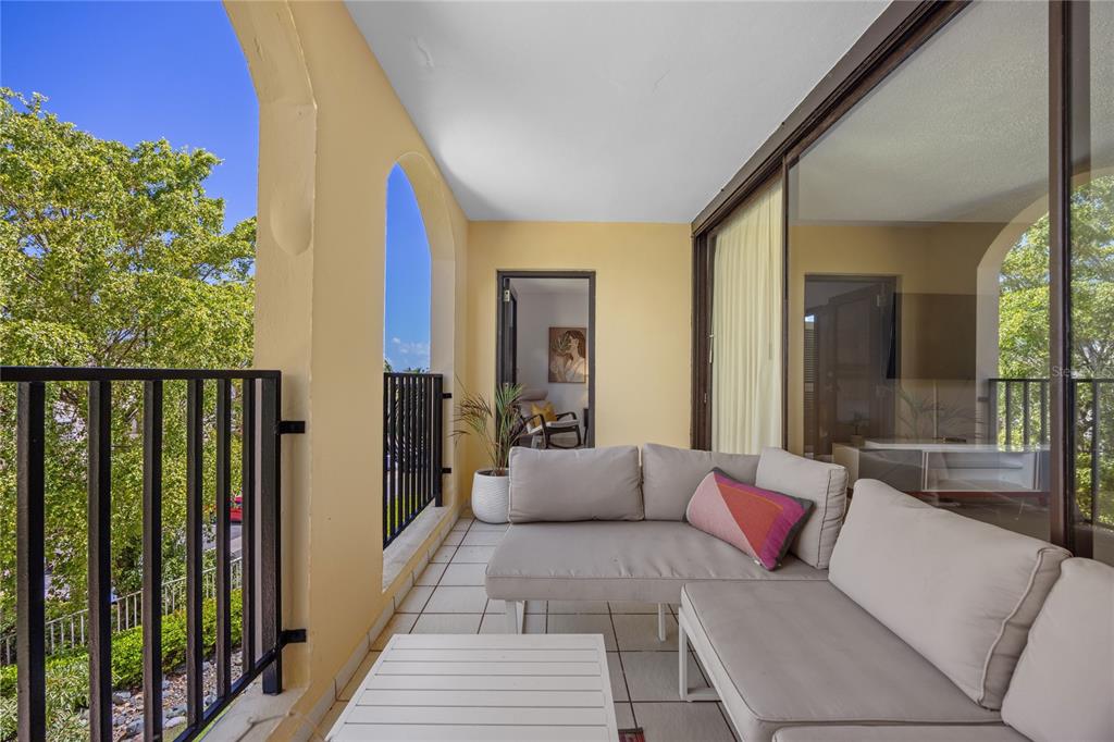 2066 Montesol, Unit 2066 Humacao, PR 00792 - Photo 10 of 29 a balcony with furniture and a potted plant