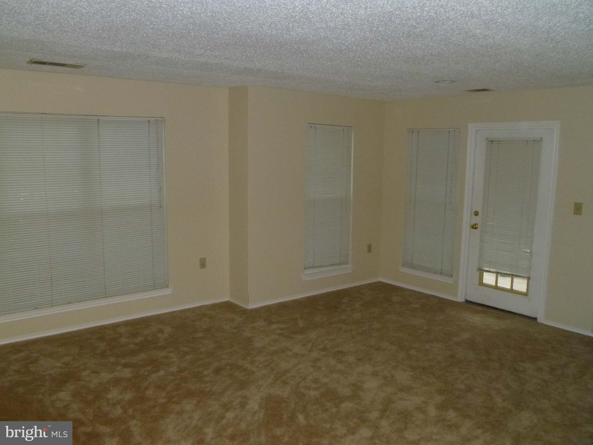21029 Timber Ridge Terrace, Unit 103 Ashburn, VA 20147 - Photo 5 of 8 Living Room