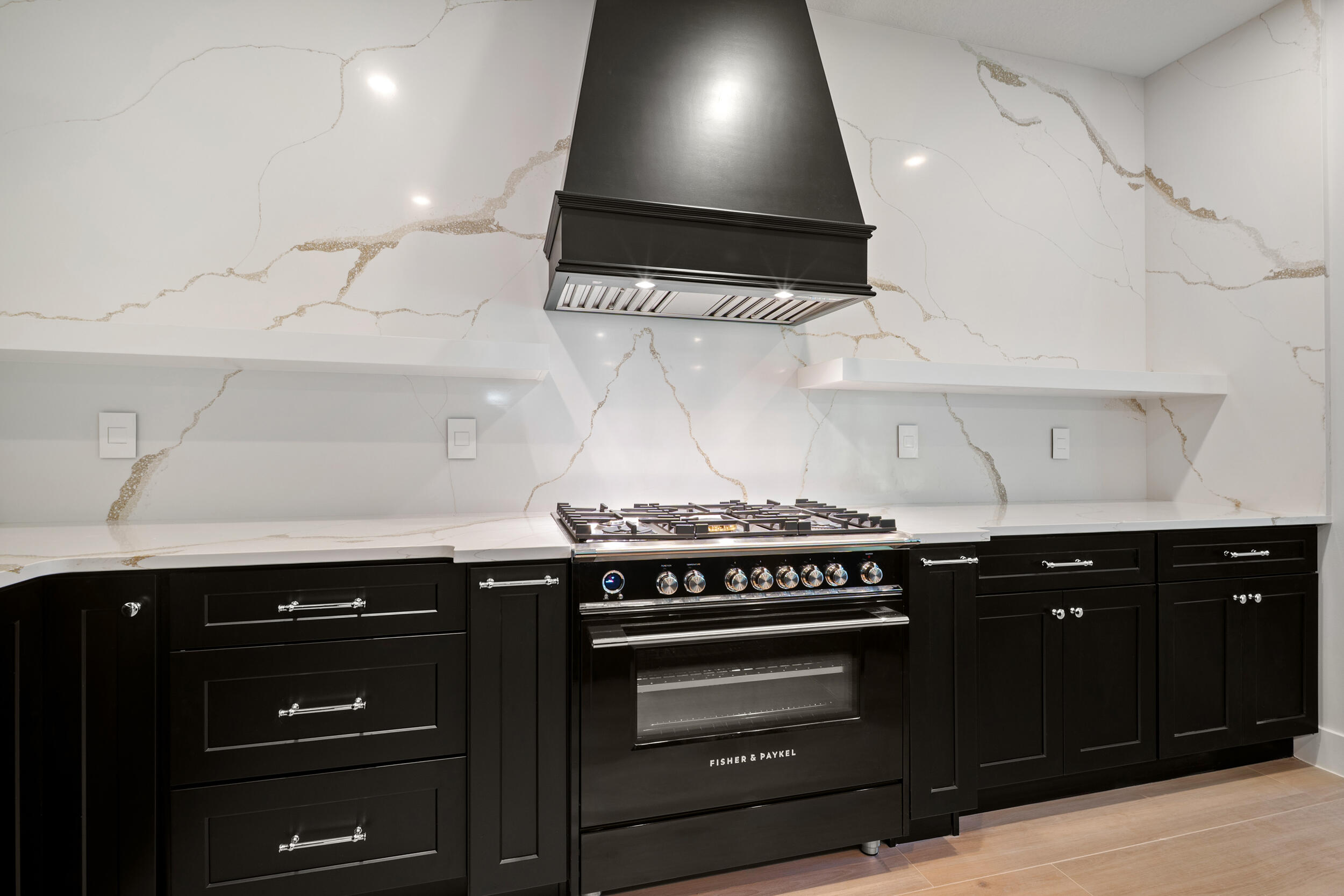 1142 Southwest Abbey Avenue Port St. Lucie, FL 34953 - Photo 18 of 57 a kitchen with a stove and a sink